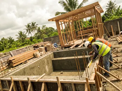 Plunge pool concrete shell and sauna framing under construction